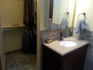 A Colorado Springs bathroom remodel with new cabinetry, sink, and tiles